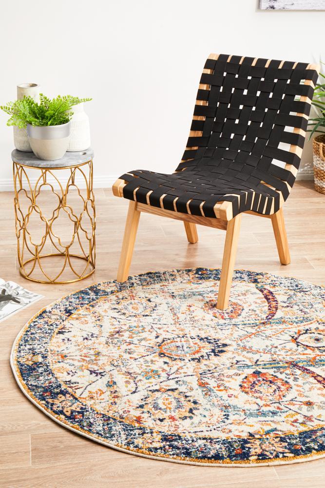 Waken Round Rug - Ivory Peacock.