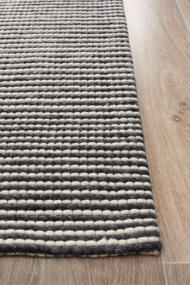 Studio Oskar Felted Wool Striped Rug Black White.