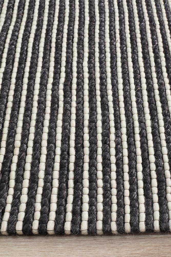 Studio Oskar Felted Wool Striped Rug Black White.