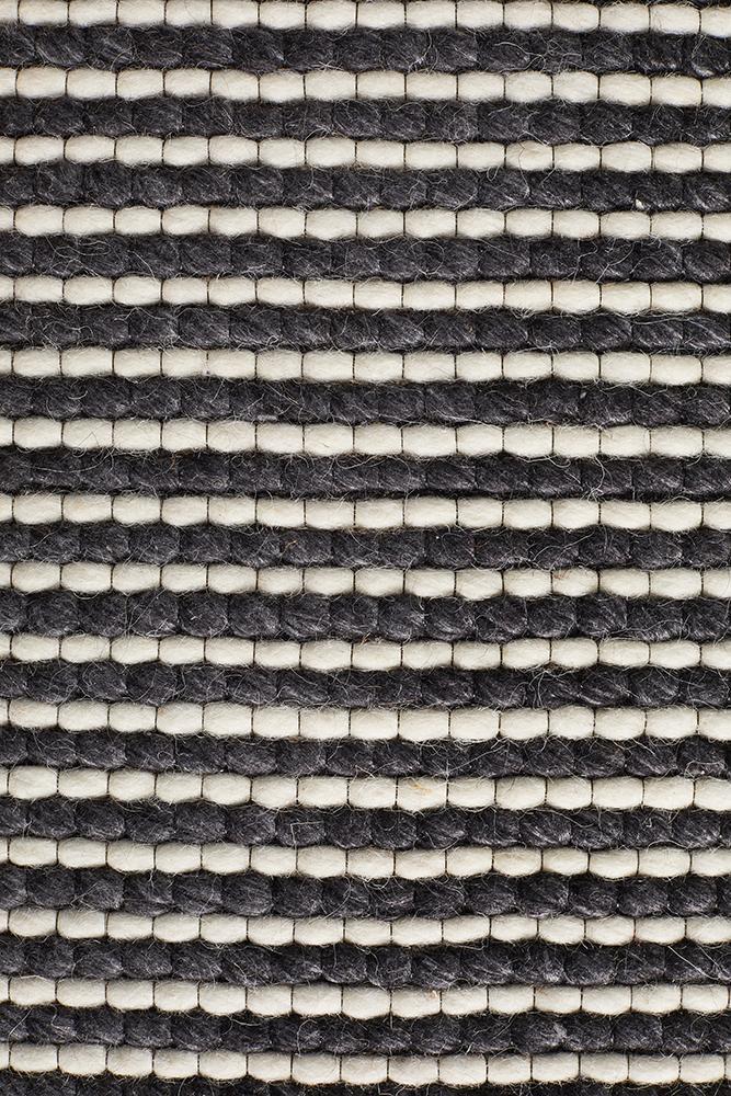 Studio Oskar Felted Wool Striped Rug Black White.