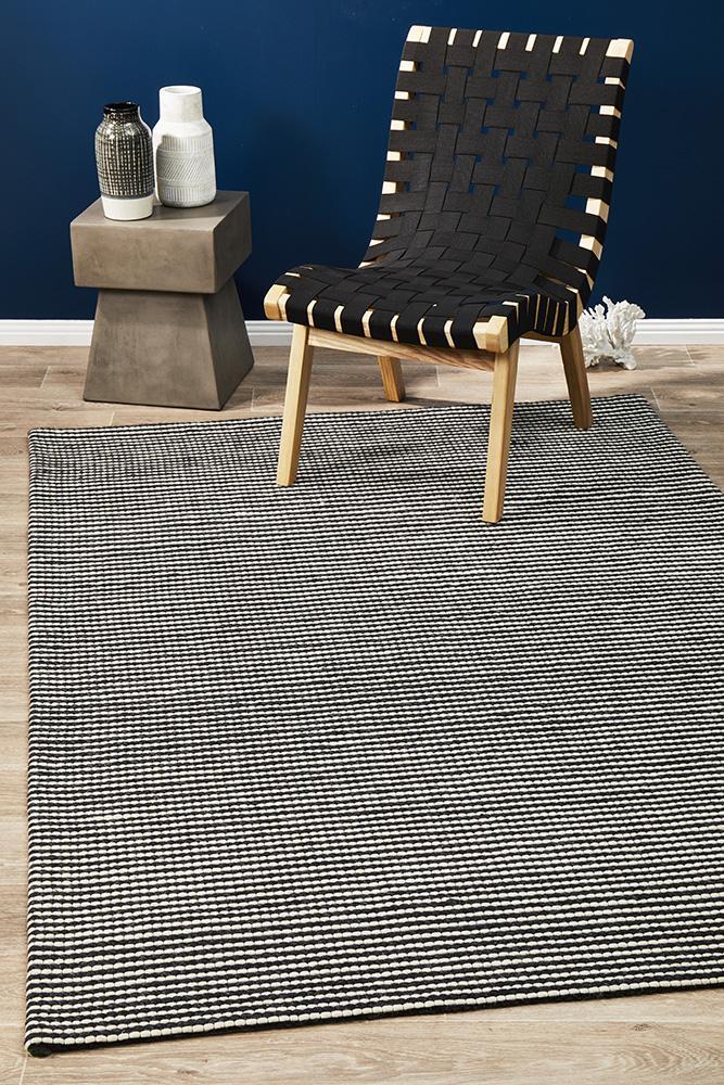 Studio Oskar Felted Wool Striped Rug Black White.